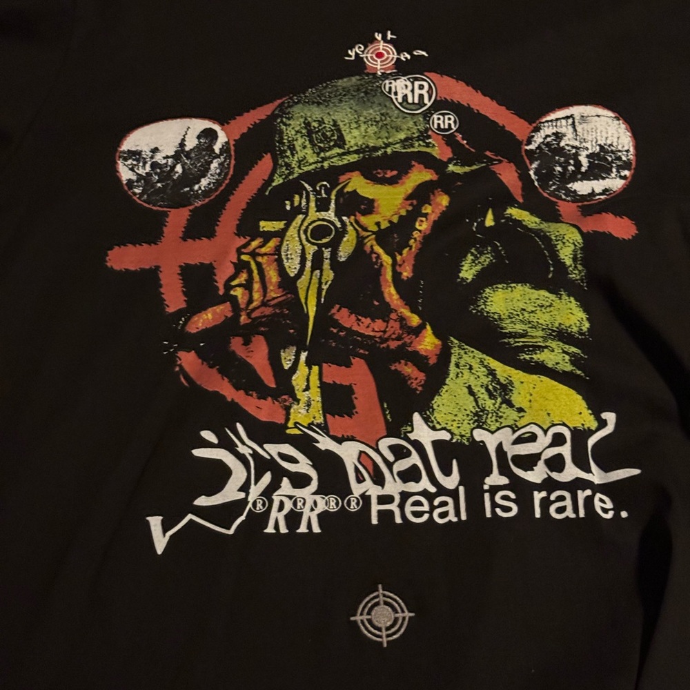 Black Graphic Tee with Bold Design by raf Reyes new